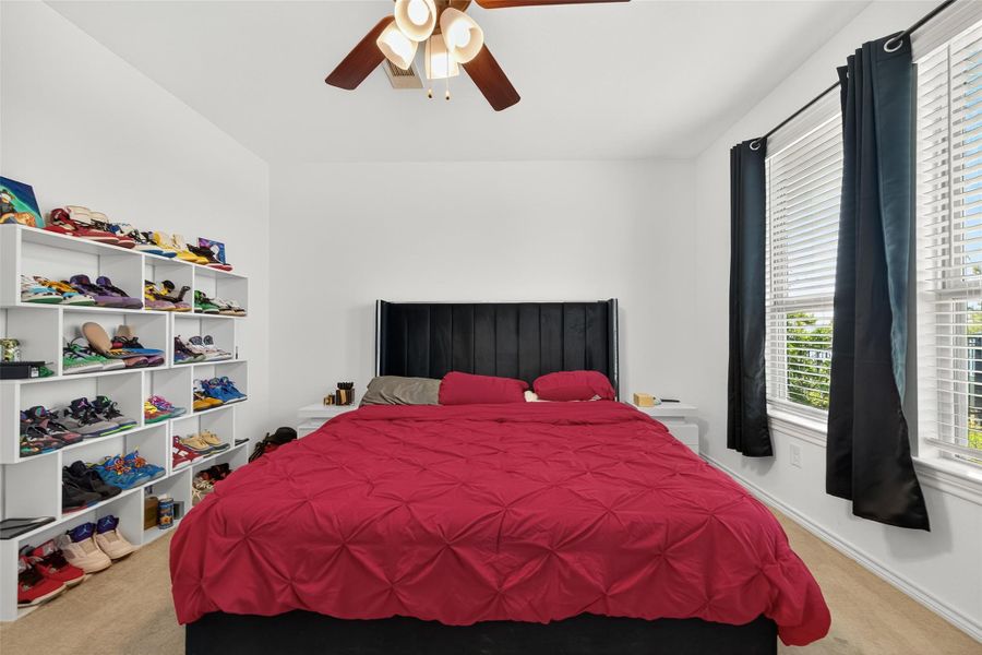 Furnished interior view inside a new home in Sunterra, Katy (Image 33).