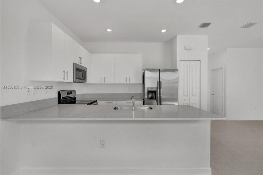 Furnished interior view inside a new home in , Homestead (Image 6). Furnished interior view inside a new home in , Homestead (Image 6).