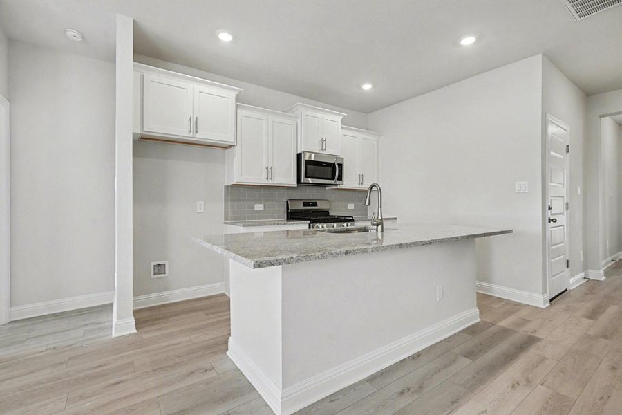 Furnished interior view inside a new home in Bayou Maison, Dickinson (Image 7).