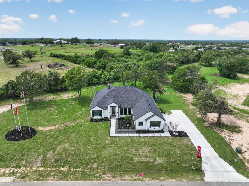 Representative exterior photo of a completed home built from the Wichita by Cheldan Homes in Arbor Oaks, Boyd, TX (Image 29).