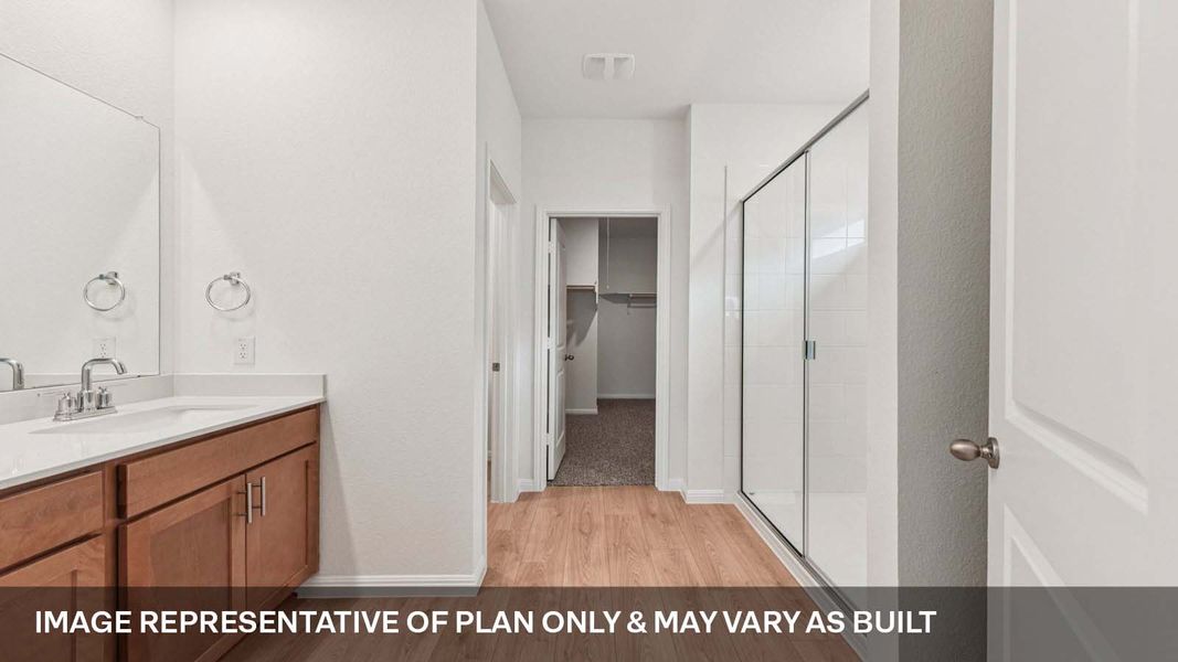 Representative furnished interior of a home built from the The Mitchell by D.R. Horton in Bar W Ranch, Leander (Image 9).