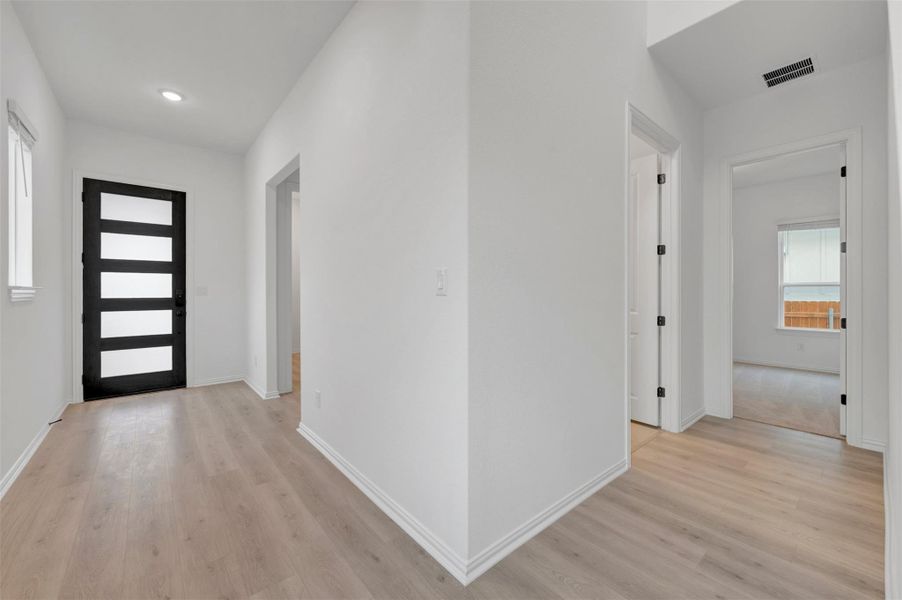 Spacious, unfurnished interior of a new home in Heritage, Dripping Springs (Image 21).