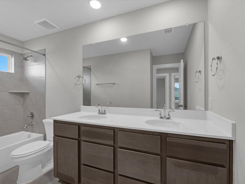 Furnished interior view inside a new home in Mason Woods, Cypress (Image 10). Furnished interior view inside a new home in Mason Woods, Cypress (Image 10).