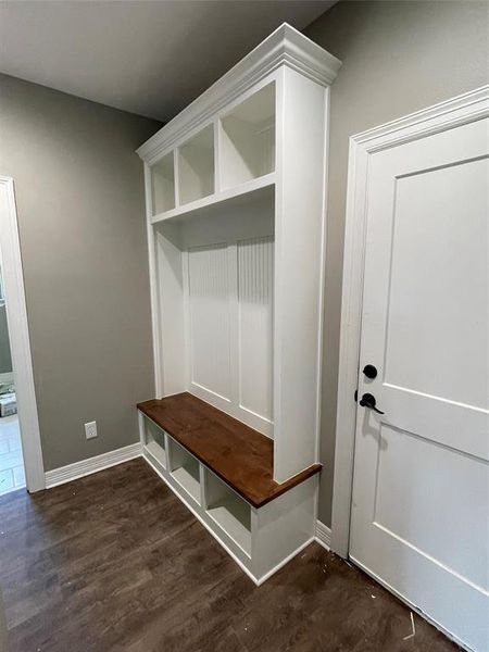 Mudroom with dark wood-type flooring