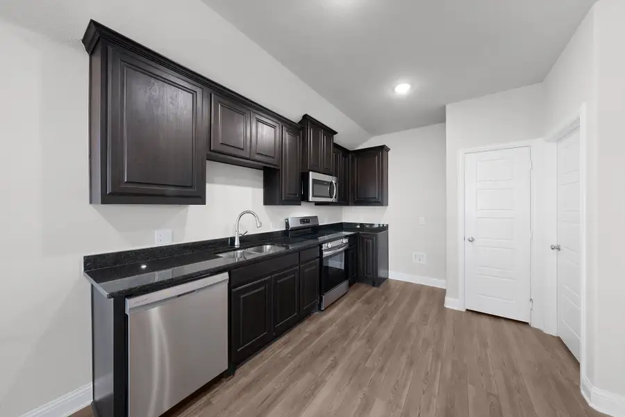 Furnished interior view inside a new home in Stonecreek, Sulphur Springs (Image 6).