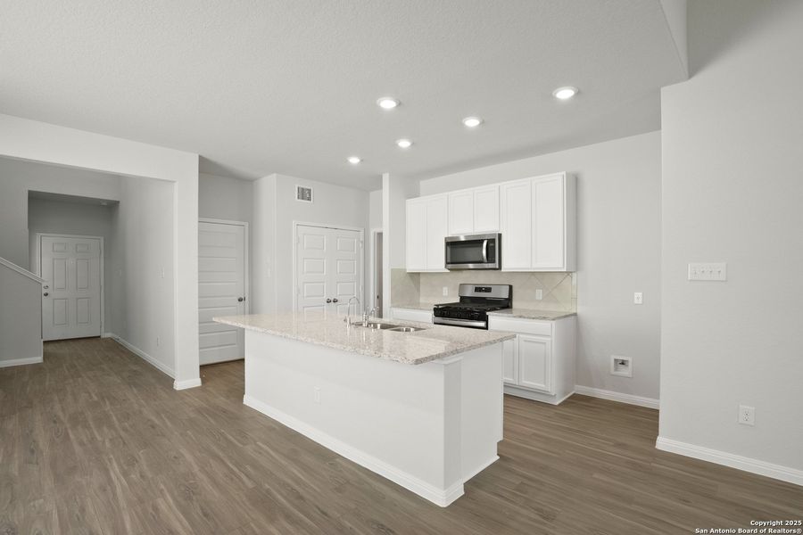 Furnished interior view inside a new home in Timber Creek, San Antonio (Image 7).