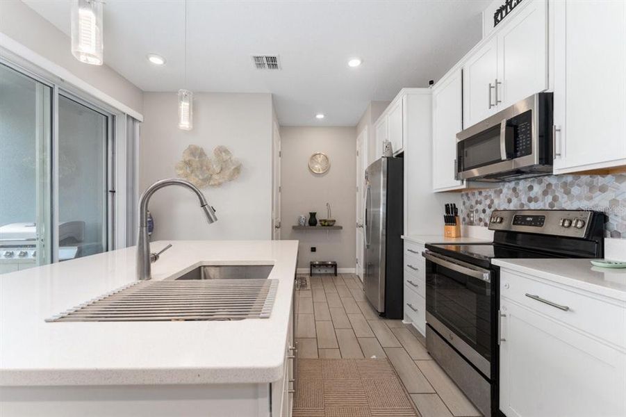 Furnished interior view inside a new home in Urban Collection at Big Sky, Kissimmee (Image 16).