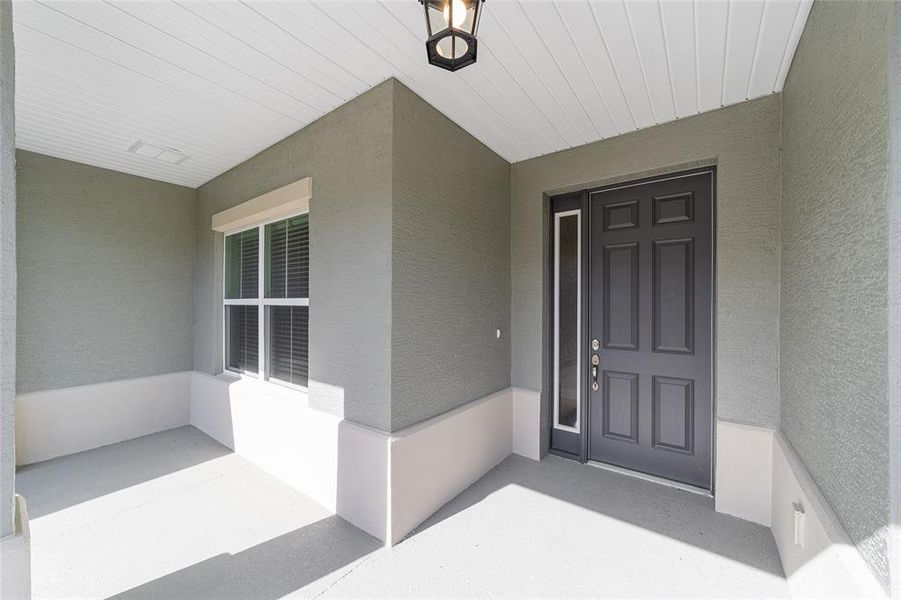 Exterior details and patio area of a home in On Top of the World Communities, Ocala (Image 23).