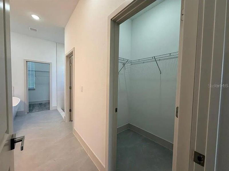 Primary ensuite with 2 walk-in closets