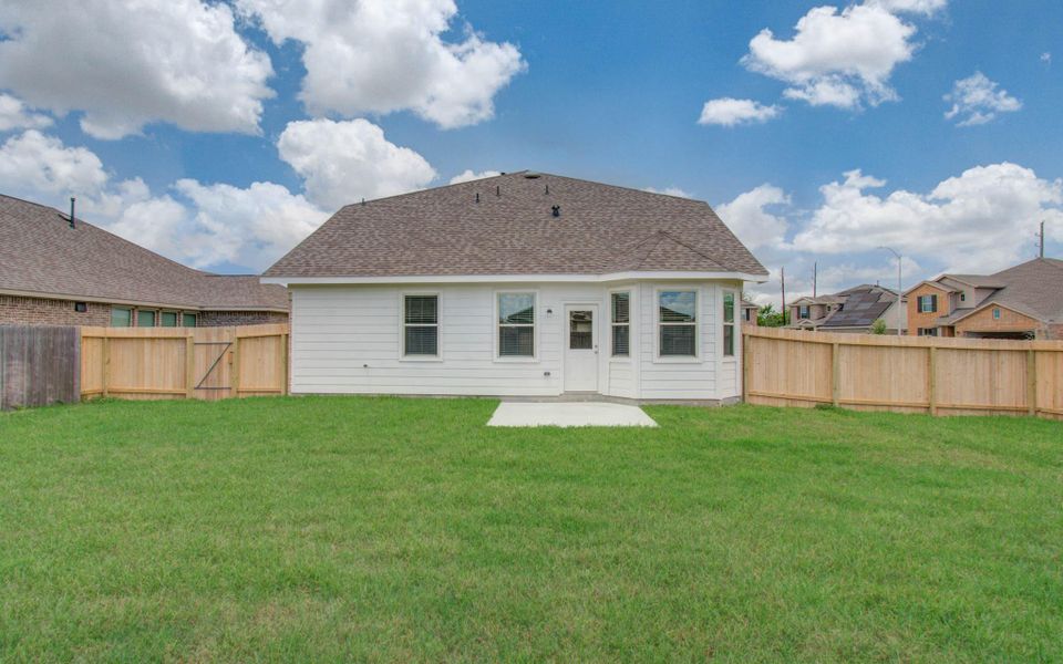 Exterior details and patio area of a home in Legends Bay, Baytown (Image 4).