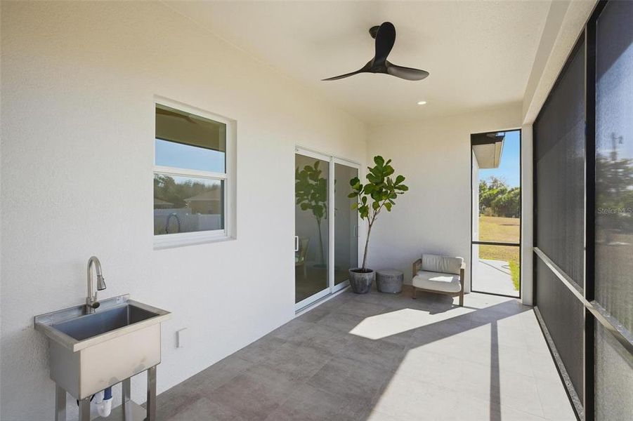 Exterior details and patio area of a home in , North Port (Image 28).