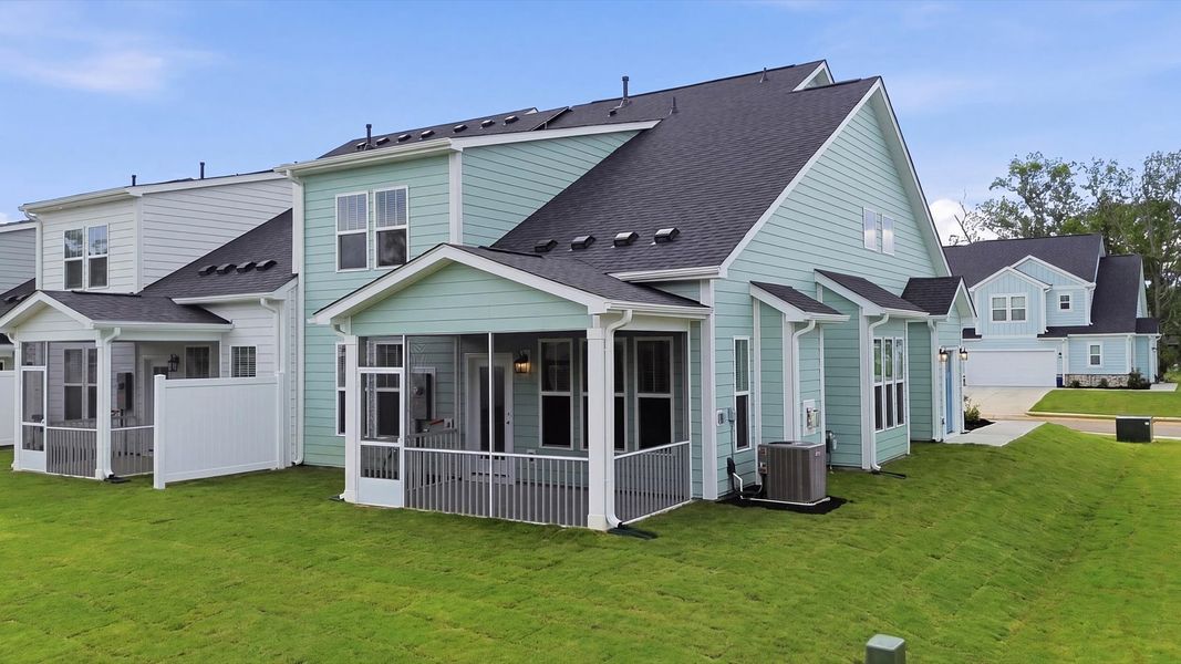 Exterior details and patio area of a home in Village at Midway, Anderson (Image 19).