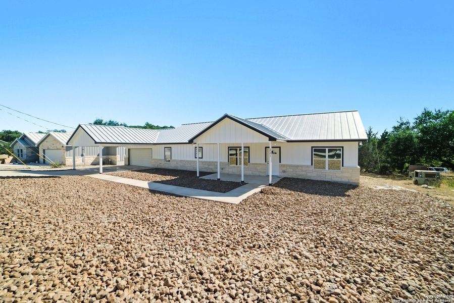 Exterior details and patio area of a home in , Lakehills (Image 20).