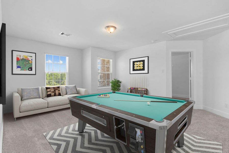 Versatile and vibrant, this large game room can serve as a second living area, home theater, or activity center for the whole family. The possibilities are endless in this inviting upstairs retreat! Versatile and vibrant, this large game room can serve as a second living area, home theater, or activity center for the whole family. The possibilities are endless in this inviting upstairs retreat!