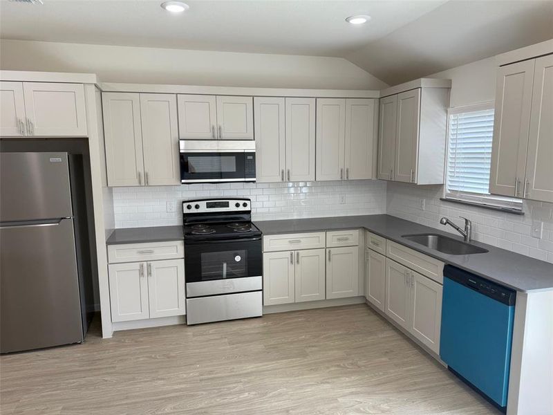 stainless steel appliance inc. fridge. quartz countertops and subway tile backsplash stainless steel appliance inc. fridge. quartz countertops and subway tile backsplash