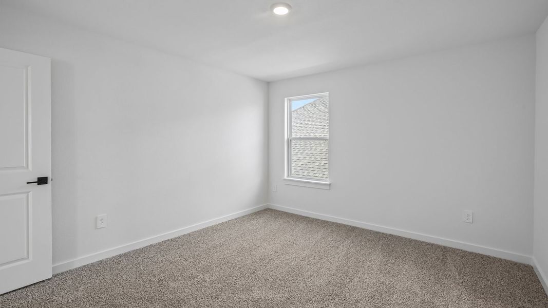 Spacious, unfurnished interior of a new home in Rosenbusch Ranch, Leander (Image 46).