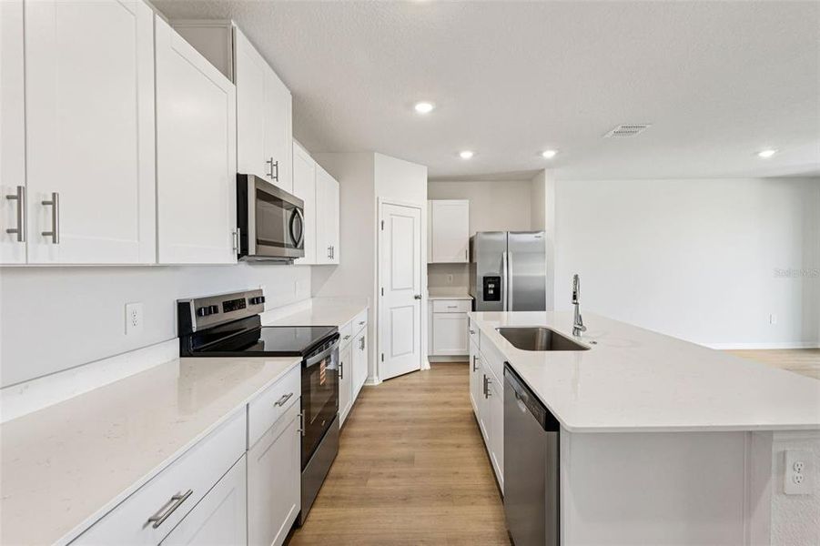 Furnished interior view inside a new home in Wynnstone - Signature Series, Davenport (Image 8).