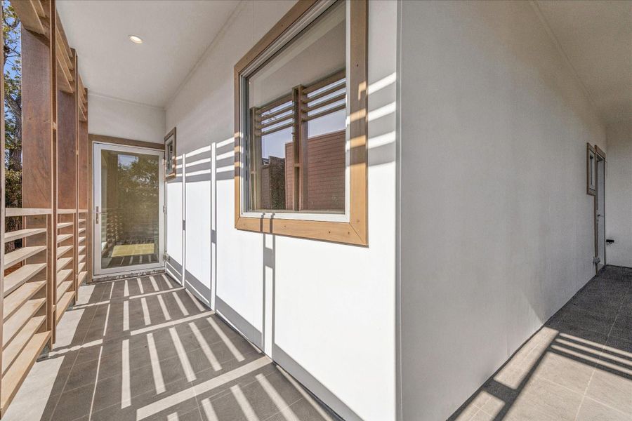 Exterior details and patio area of a home in , Houston (Image 27). Exterior details and patio area of a home in , Houston (Image 27).