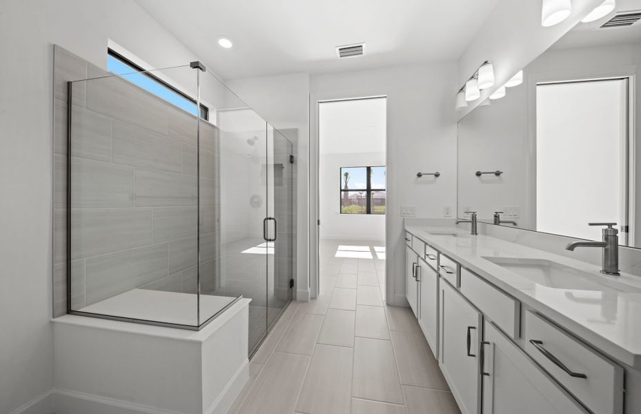 Spacious glass shower in owner's bathroom