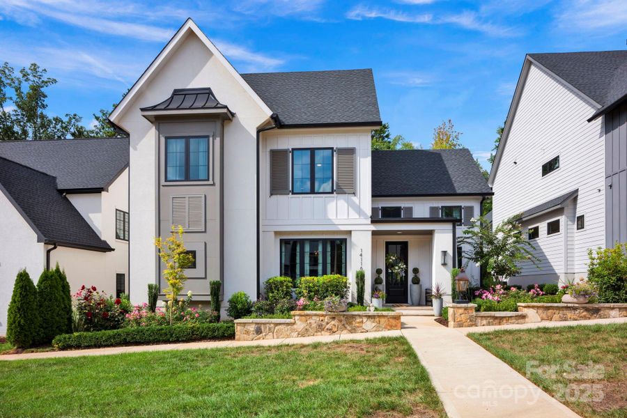 Front exterior of a new home in , Davidson, NC, highlighting curb appeal (Image 20).