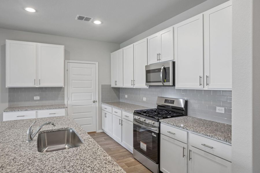 Furnished interior view inside a new home in Cloverleaf, Austin (Image 7).