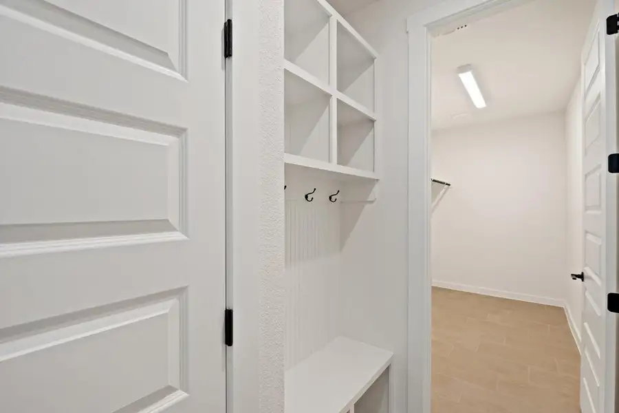 Furnished interior view inside a new home in Wolf Ranch, Georgetown (Image 9).