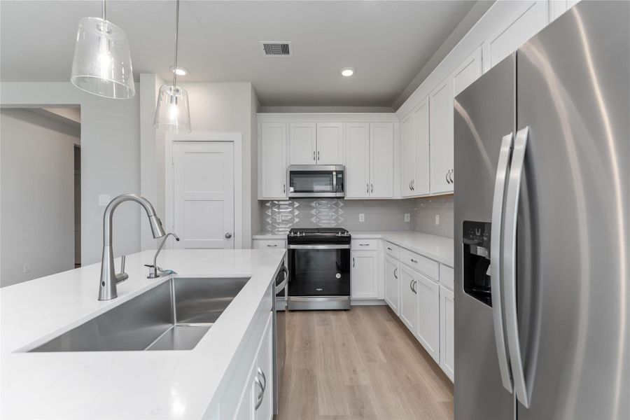 Furnished interior view inside a new home in Sunrise Cove, Texas City (Image 6).