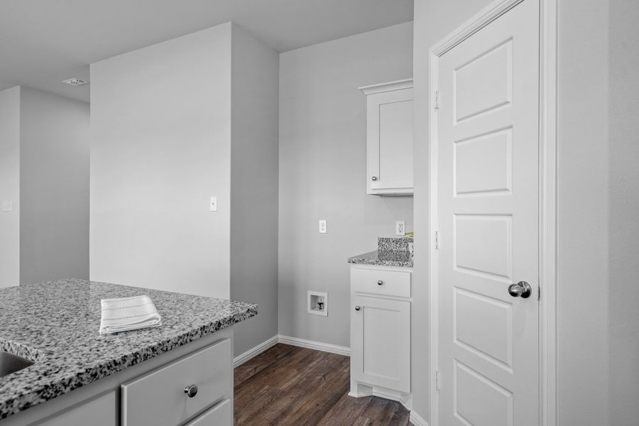 Representative furnished interior of a home built from the BELLVUE by D.R. Horton in Faculty Row, Abilene (Image 16).