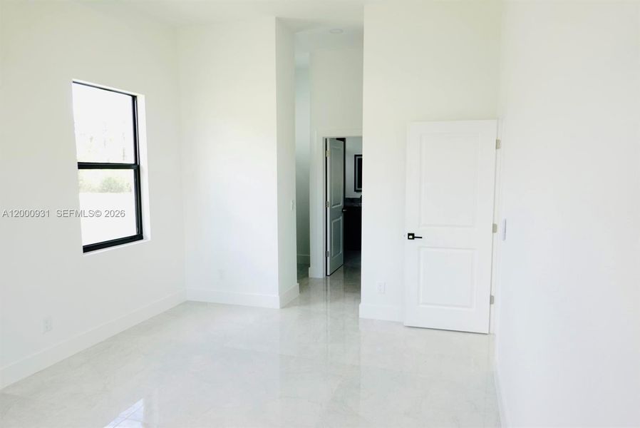 Spacious, unfurnished interior of a new home in , Port Charlotte (Image 27).