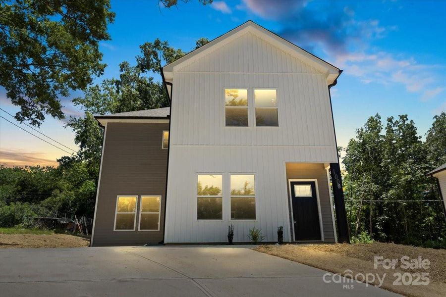 Front exterior of a new home in , Albemarle, NC, highlighting curb appeal (Image 2).