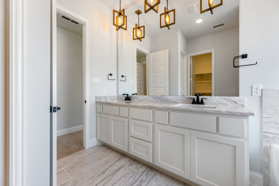 Representative furnished interior of a home built from the Cameron by UnionMain Homes in Cambridge Crossing, Celina (Image 8).