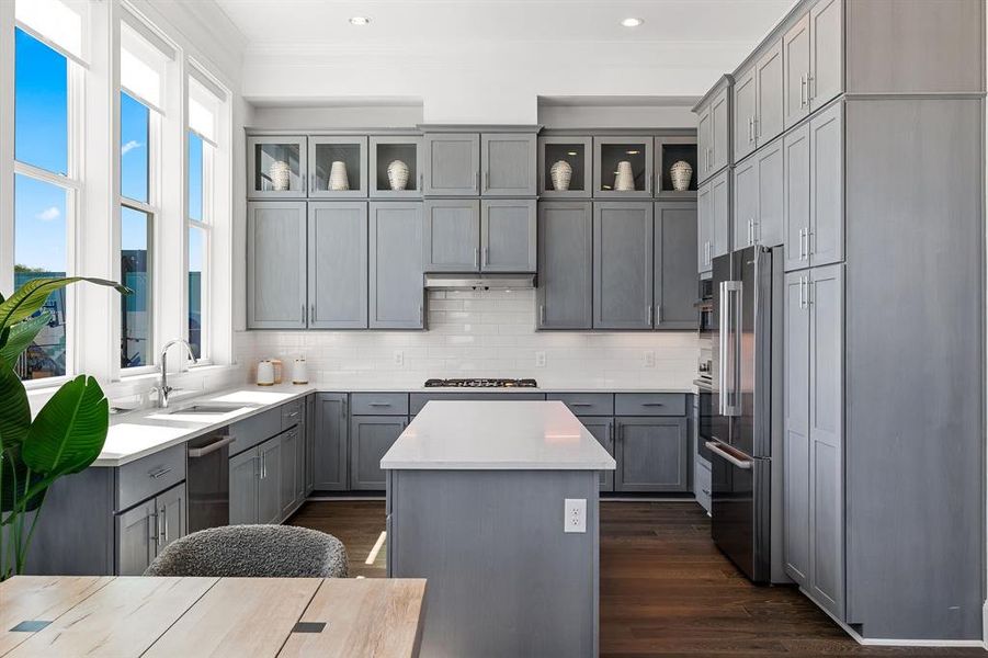 Image of model home with similar floorplan.