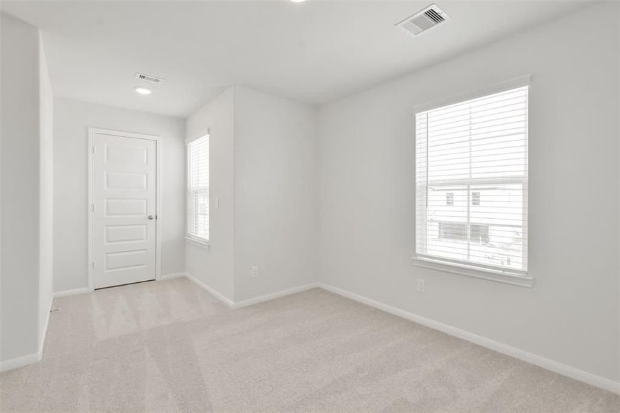 Spacious, unfurnished interior of a new home in Lakes at Black Oak, Magnolia (Image 37).