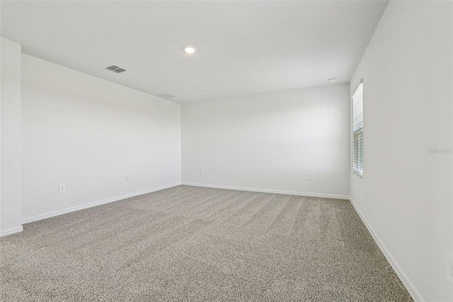 Spacious, unfurnished interior of a new home in Lake Deer Estates - Signature Series, Poinciana (Image 30).