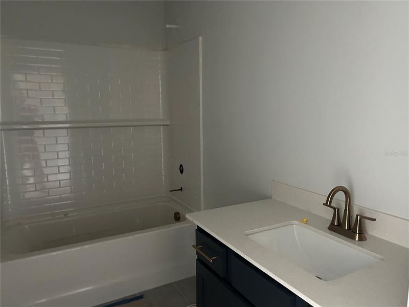 In-progress construction of a new home in Oakfield Trails Signature, Parrish, FL (Image 23).