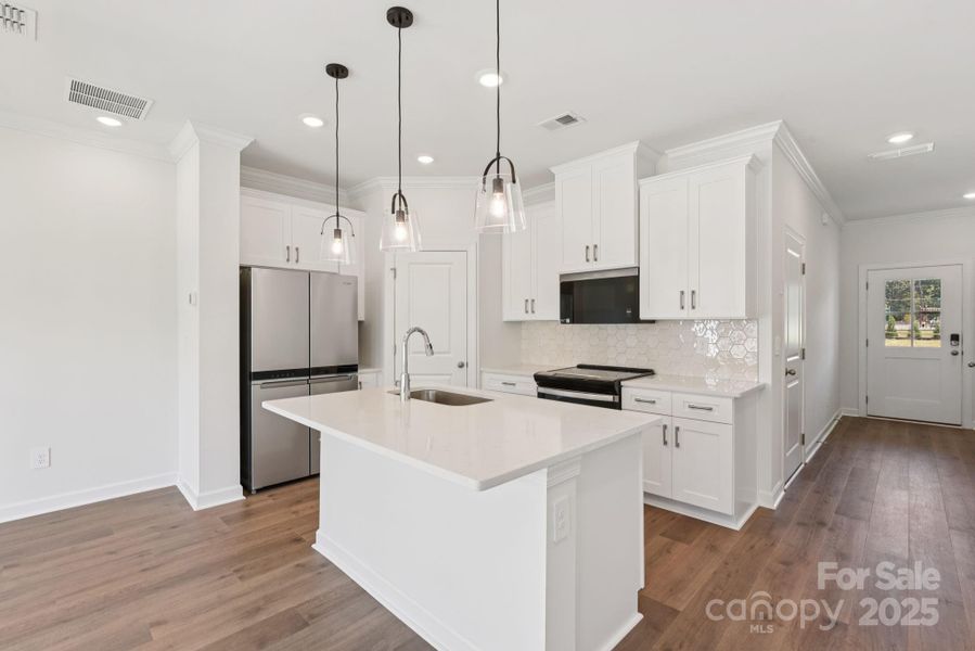 Photo is not of the actual home, but is an inspirational photo of builder’s model home and may depict options, furnishings, and/or decorator features that are not included