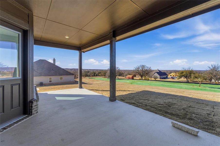Exterior details and patio area of a home in Oak Grove Addition, Springtown (Image 3).