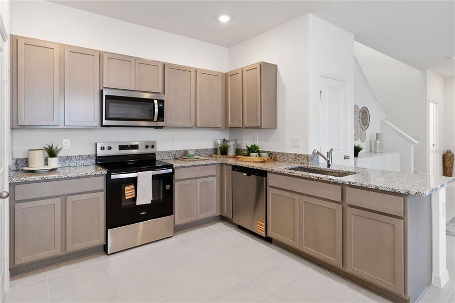 Furnished interior view inside a new home in Bellaviva III at Westside, Davenport (Image 7).
