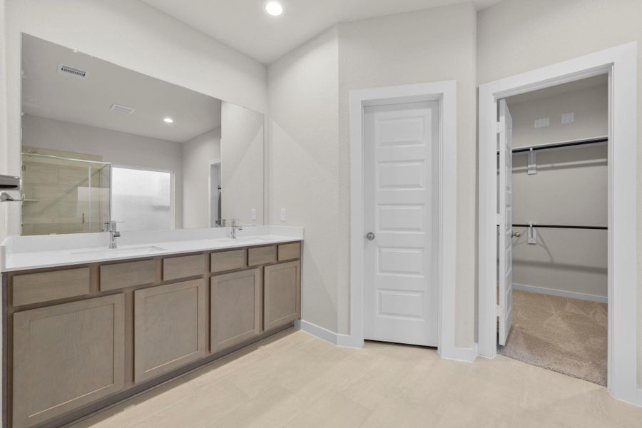 Furnished interior view inside a new home in Barton Creek Ranch, Conroe (Image 13).