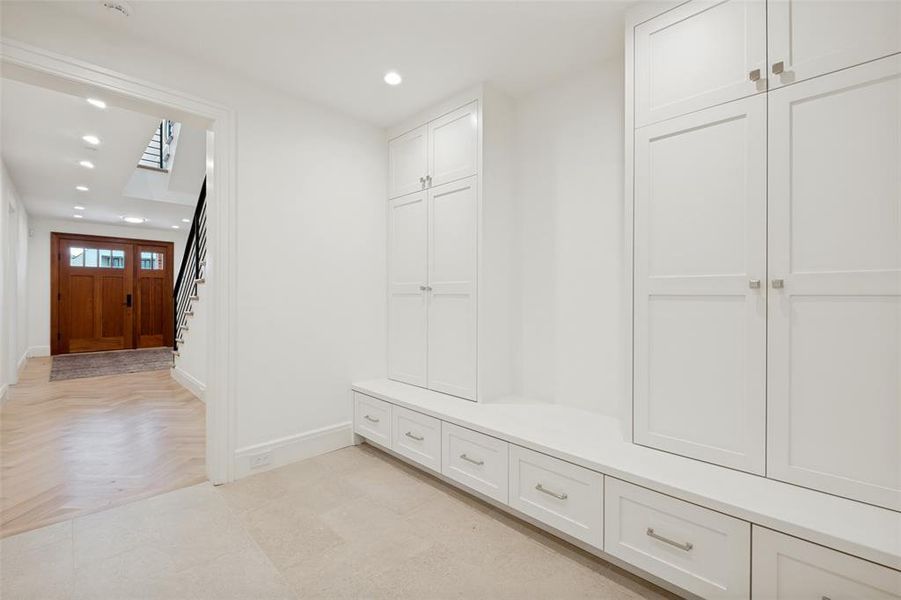 Organized mudroom is accessed from the garage. Great storage and organizing area. Organized mudroom is accessed from the garage. Great storage and organizing area.