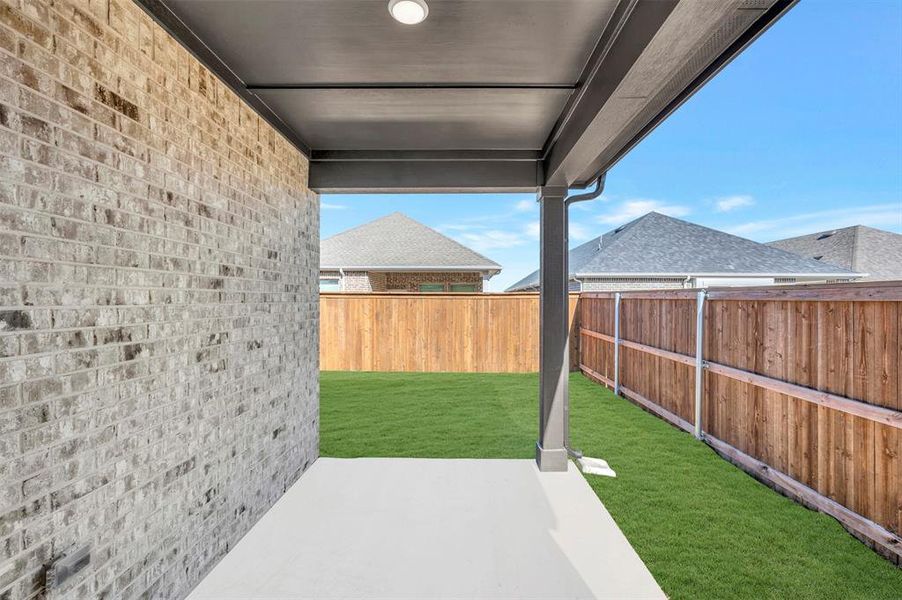 Exterior details and patio area of a home in Creekshaw – Gardens, Royse City (Image 19).
