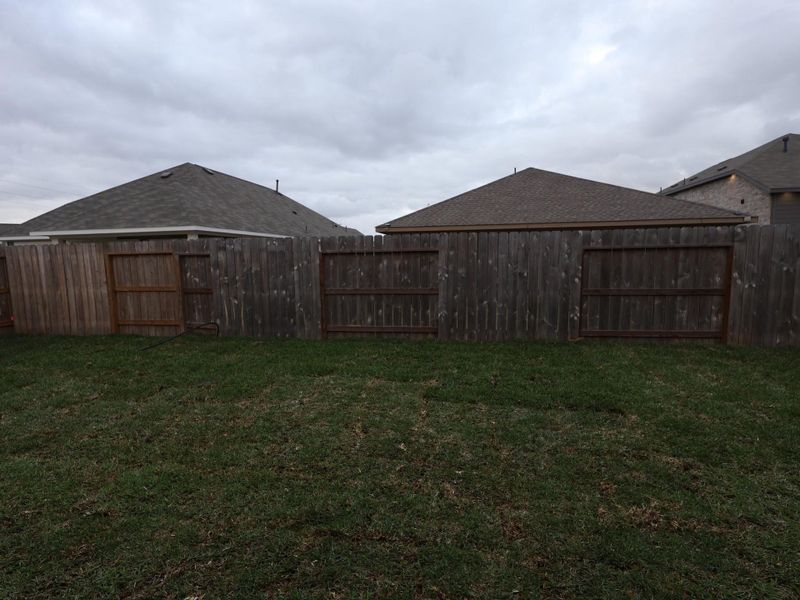 Exterior details and patio area of a home in Miller's Pond, Rosenberg (Image 17).