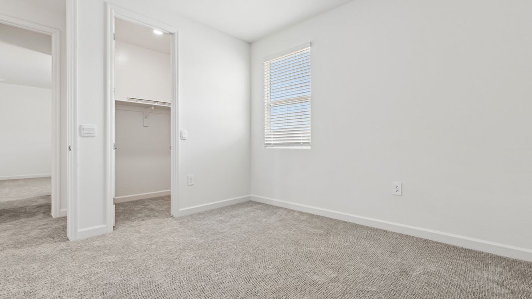 Representative unfurnished interior of a home built from the Phoenician by D.R. Horton in The Ridge at Stone Butte, Phoenix (Image 44). Representative unfurnished interior of a home built from the Phoenician by D.R. Horton in The Ridge at Stone Butte, Phoenix (Image 44).