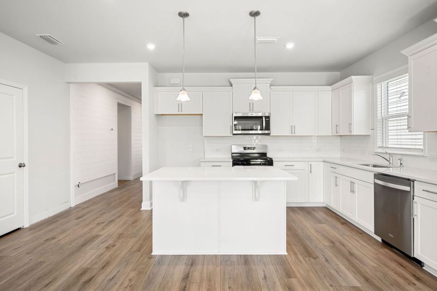 Furnished interior view inside a new home in Salem Bay, Beaufort (Image 8).