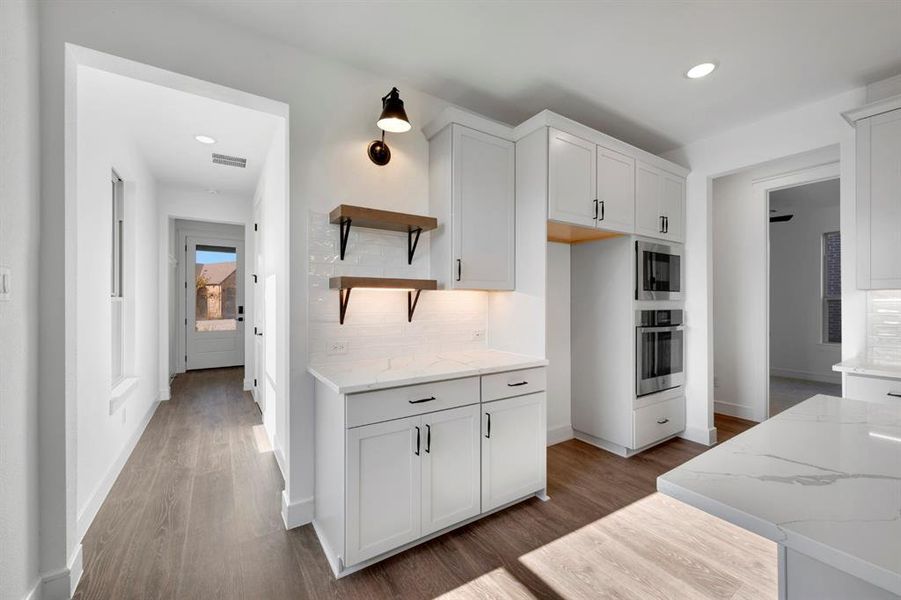 Furnished interior view inside a new home in Heath Golf & Yacht Villas, Heath (Image 7).