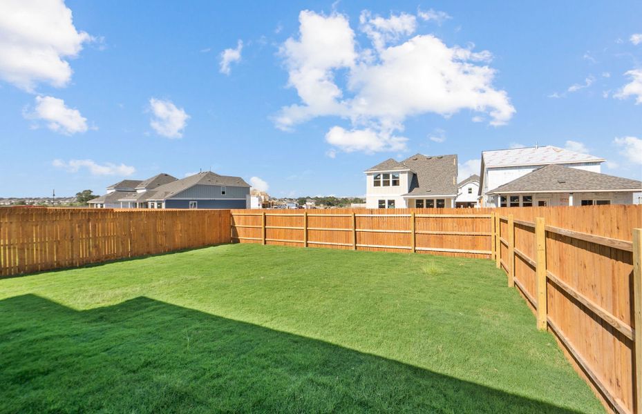 Exterior details and patio area of a home in Santa Rita Ranch, Liberty Hill (Image 25). Exterior details and patio area of a home in Santa Rita Ranch, Liberty Hill (Image 25).