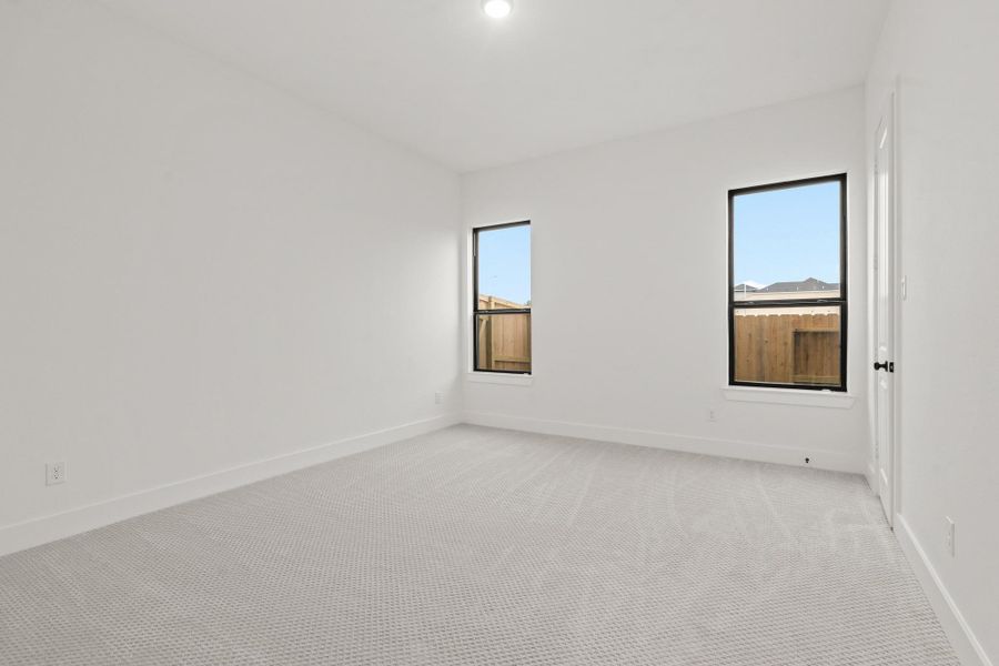 Spacious, unfurnished interior of a new home in Legacy Prairie at Katy Court 60', Katy (Image 9).