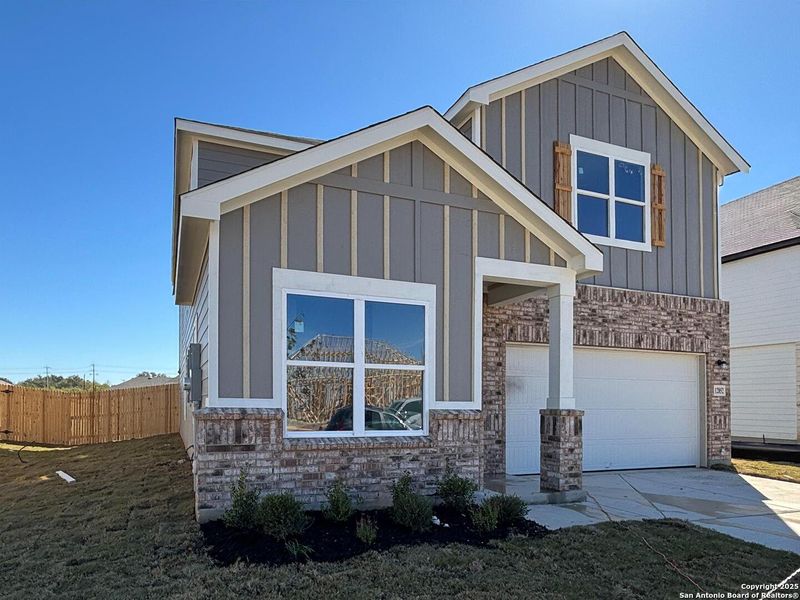 Front exterior of a new home in , Schertz, TX, highlighting curb appeal (Image 1).