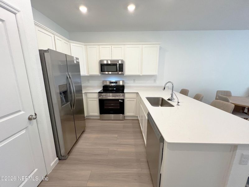 Furnished interior view inside a new home in , Orange Park (Image 7).