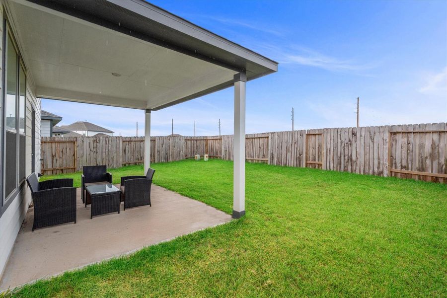 Exterior details and patio area of a home in Bluestem, Brookshire (Image 27). Exterior details and patio area of a home in Bluestem, Brookshire (Image 27).